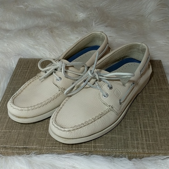 cream boat shoes